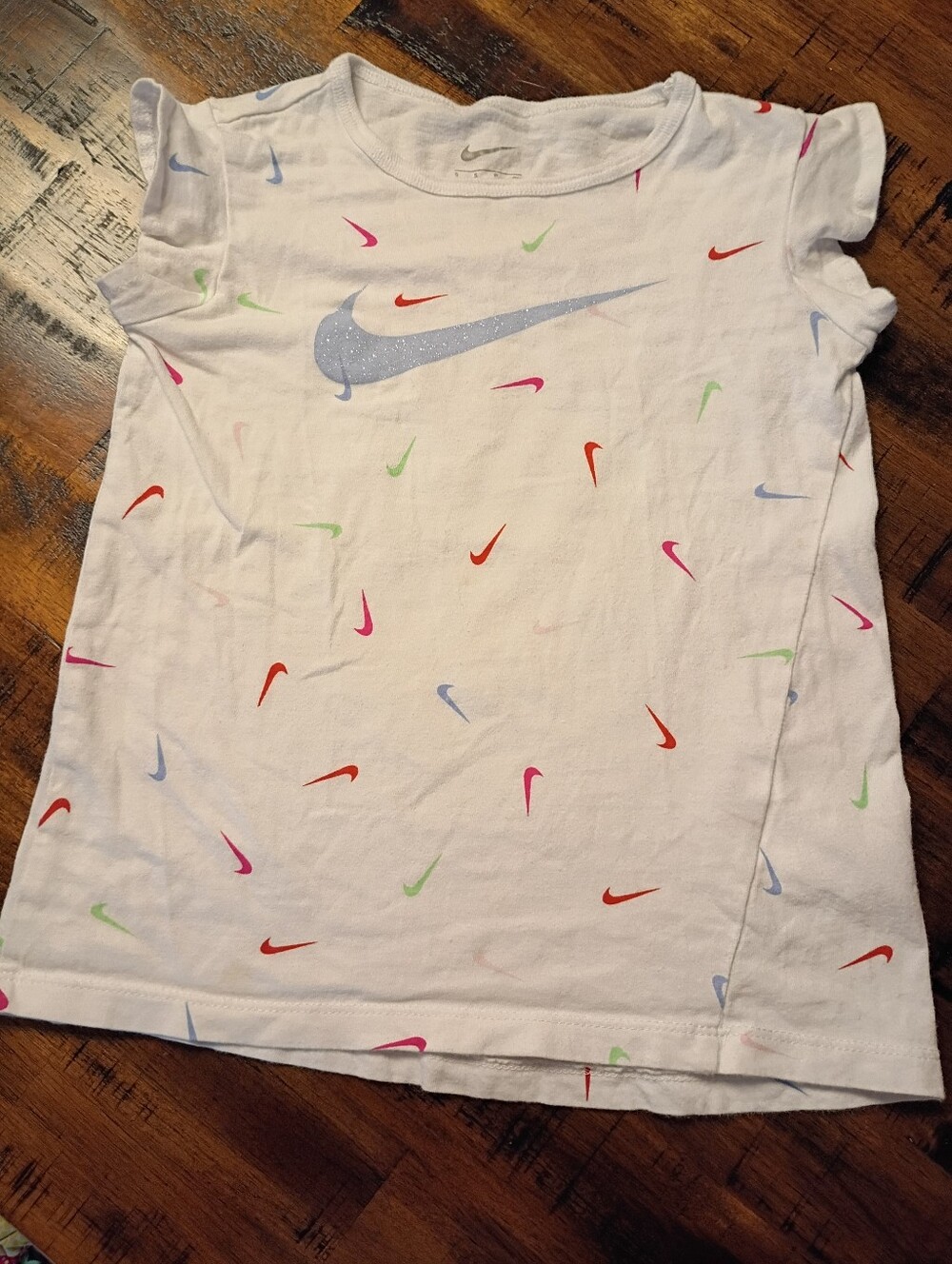 Nike White Tee with Glitter Blue Swoosh and Multicolor Mini Swooshes